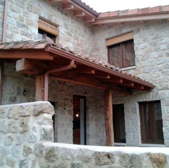 Construcciones y Reformas Teo & Dani casa en piedra con tejado